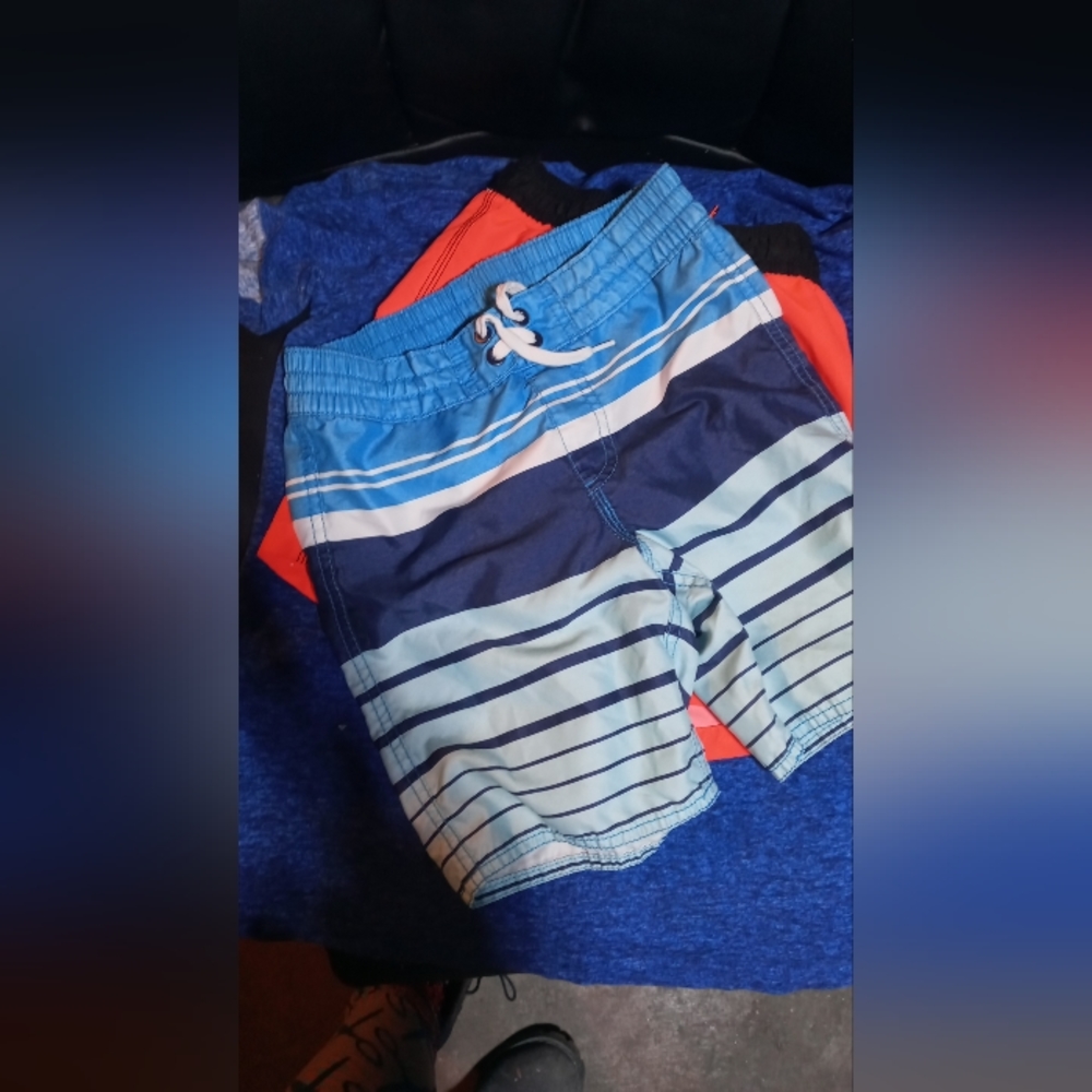 Child swimming shores